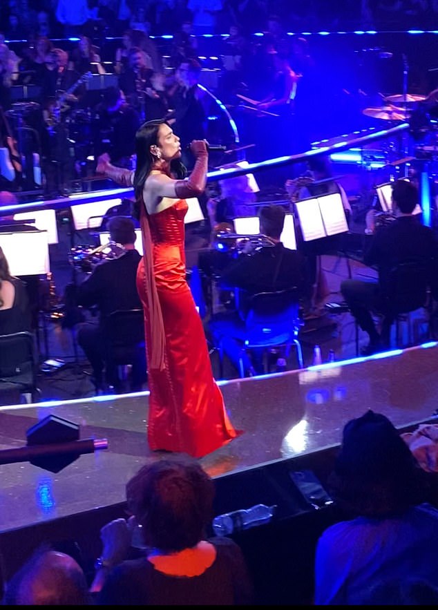 Elsewhere during the concert, Dua Lipa performed 19 of her songs, reimagined with a 53-piece orchestra and a 14-piece choir, with her seven-piece band.