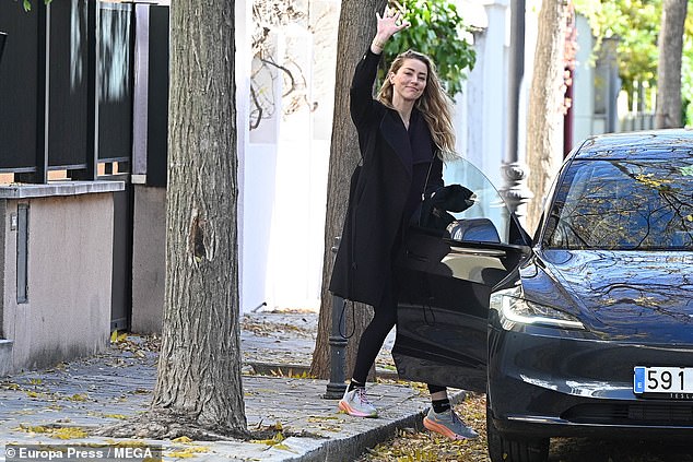 The Hollywood actress appeared in good spirits as she smiled and waved as she jumped in a car to go for a run in El Retiro Park