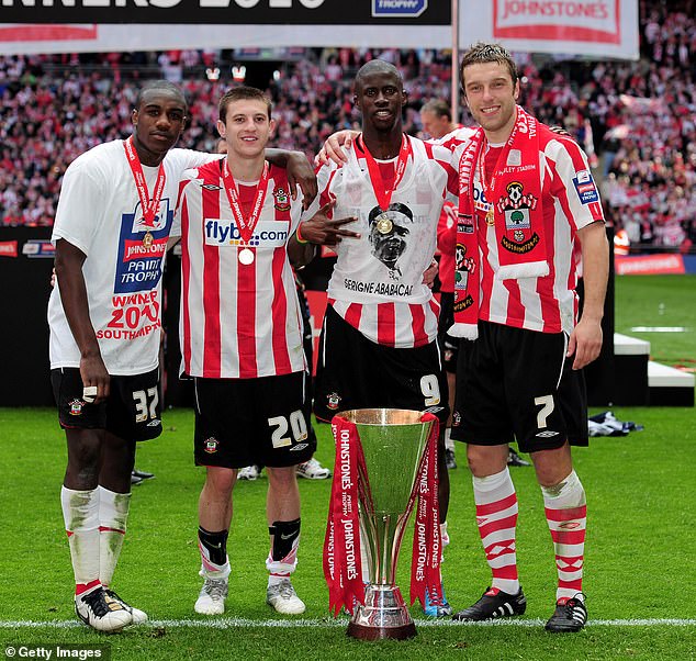 He was part of the Southampton squad that won the Johnstone's Paint Trophy in 2010, along with Adam Lallana (second from left) and Ricky Lambert (right)