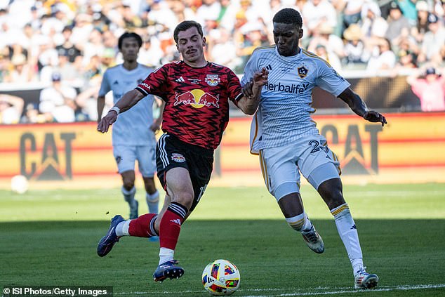 Carlos Garcia (right) defends during the second half of the MLS Cup final