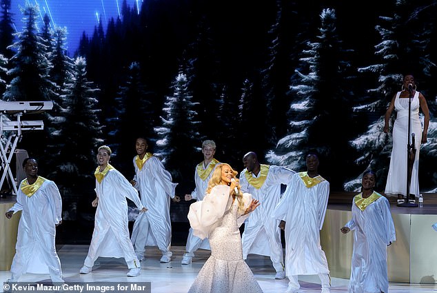 Carey, 55, was offstage at the time of the incident. Her chorus filled the time as she prepared for her final song of the evening (pictured in Highland, CA in November)