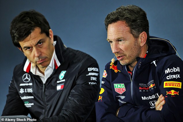 Horner reacted cheekily to Toto Wolff's (left) statement that he is a 'yipping little terrier'