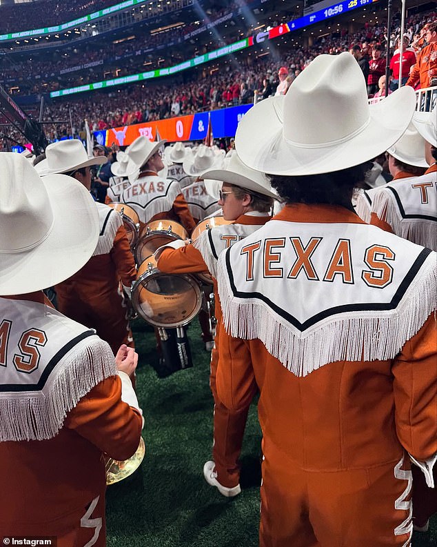 She wrapped the post with an image of the Texas marching band performing on the football field before kickoff