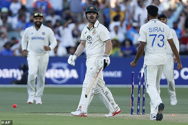 It came after Travis Head (centre) and Siraj (right) engaged in a fiery war of words after the Indian pace bowler dismissed the Australian on Sunday