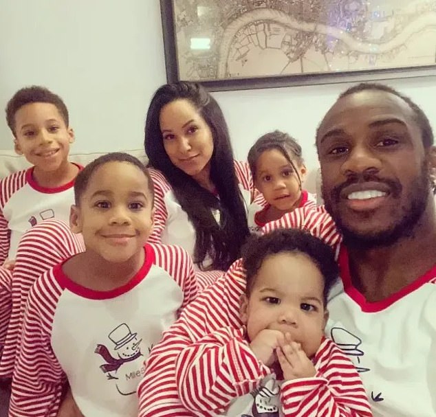 Antonio, pictured with his ex-wife Debbie and his four children, has played for West Ham since 2015