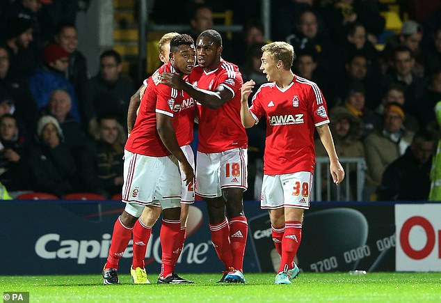 Antonio came to West Ham nine years ago from Nottingham Forest (middle of the photo, in 2014).