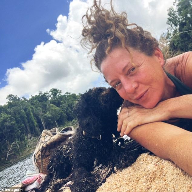 Lucy Goldswain is pictured with her dog