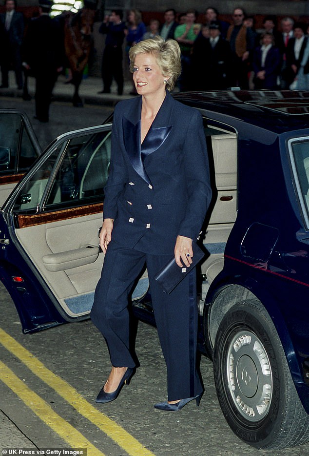 Appearing in a midnight blue two-piece for a Phil Collins concert at the Royal Albert Hall in 1990, Diana was a vision in this monochrome ensemble by Irish designer Paul Costelloe. Over the next four years it was recycled, along with matching tuxedo pants or a lace skirt