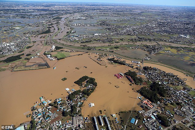 Typhoon Hagibis was Japan's deadliest storm in 60 years, causing widespread flooding (pictured). GenCast was able to warn of the arrival with an additional 12 hours of lead time, which could have helped coordinate emergency response measures in advance