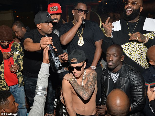 Alex Gidewon, Stalley, Sean 'Diddy' Combs, Rick Ross, Bu Thiam and Justin Bieber attend the Ciroc Party at Vanquish Lounge on February 5, 2014 in Atlanta, Georgia