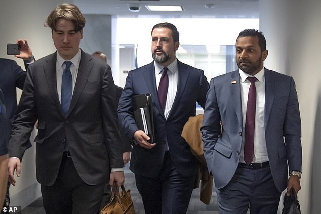 Kash Patel, right, President-elect Donald Trump as director of the FBI, leaves after a meeting in Senator John Cornyn's office