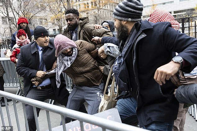 It is truly encouraging to see this jury, despite hearing the racially charged chants of outside protesters, deliver a fair verdict. (Image: A person protests the not guilty verdict and is arrested outside the courthouse in Manhattan.)