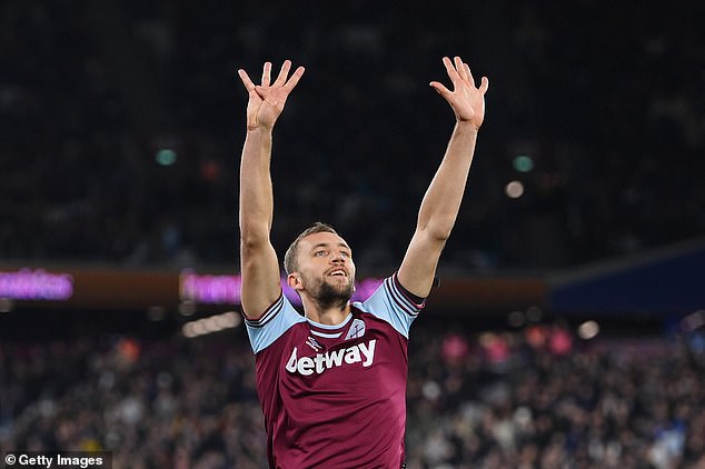 Soucek held up the number nine in honor of Hammers striker Antonio, who wears that number