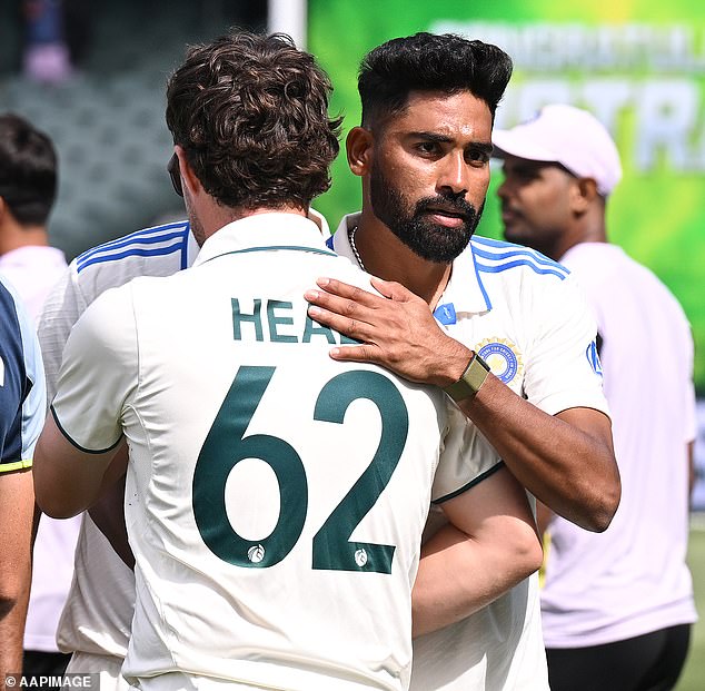 Australia's Travis Head and India's Mohammed Siraj shake hands at the end of the second Test at Adelaide Oval