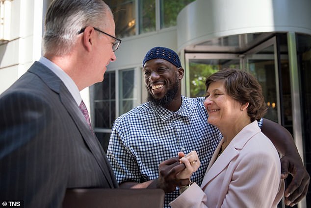 Thomas hugs his lawyers in 2017. Following Thomas' release after 20 years behind bars, lawyers celebrated the overturning of the conviction and congratulated themselves for giving Thomas a future.