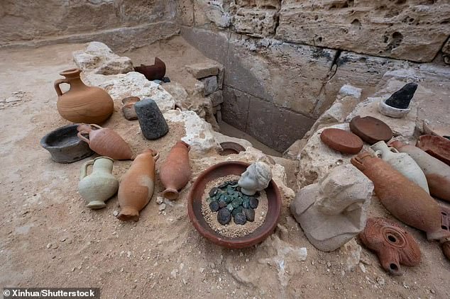 The statue and other artifacts – including coins engraved with Cleopatra's face and an assortment of pottery, oil lamps, figurines and more – were found at the Taposiris Magna temple complex, 40 kilometers west of Alexandria.