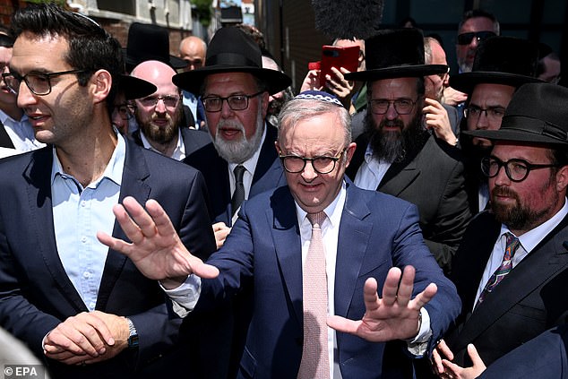 Albo, above, visits the synagogue four days later