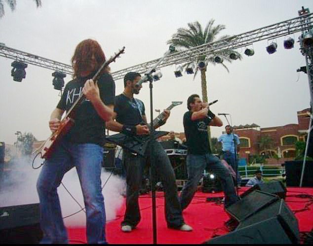 Kinney (pictured left) during his school days in Cairo. He grew his hair long, dyed it red and played electric guitar in a series of rock bands