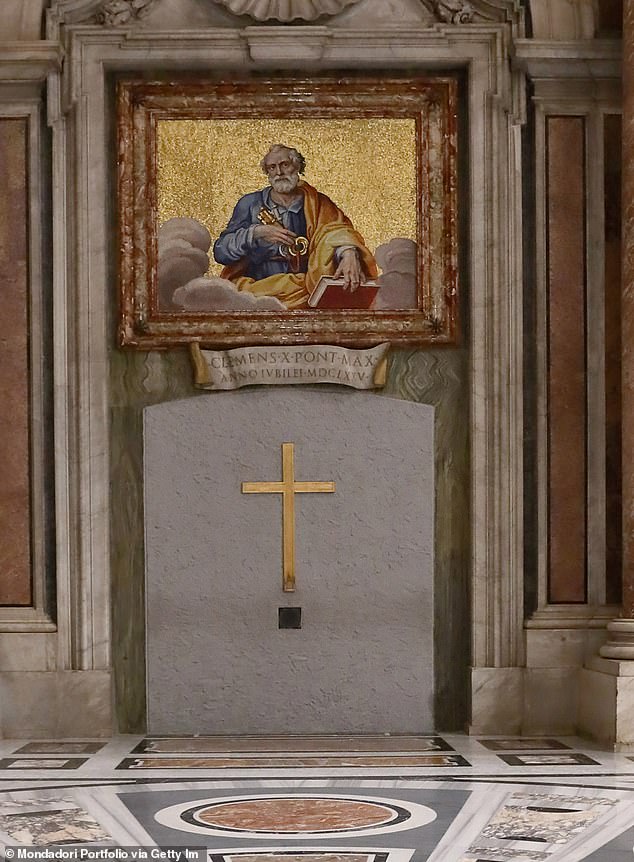 The process involves removing the brick wall covering the door (pictured in St. Peter's Basilica) from the inside of the basilica, followed by the Pope pushing open the door to mark the start of the Holy Year.