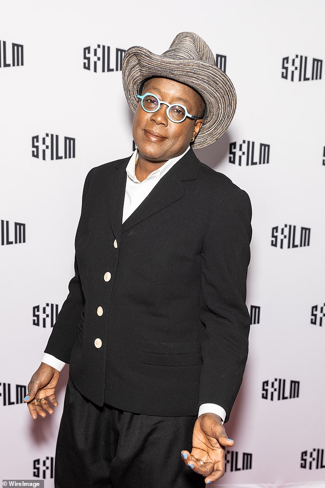 Another stylish look of the evening was that of The Watermelon Woman actor and director Cheryl Dunye. She wore a black jacket with contrasting white buttons, a braided cowboy hat and striking glasses with blue frames