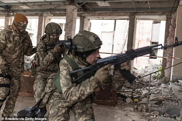 Ukrainian soldier during infantry training in a building at an unknown location in Donetsk Oblast, Ukraine on December 2