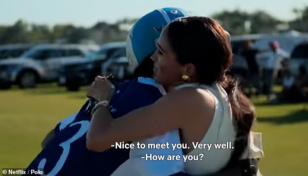 As the Duchess approached Adolfo on the pitch, the player reached out for a handshake - before Meghan went in for a hug