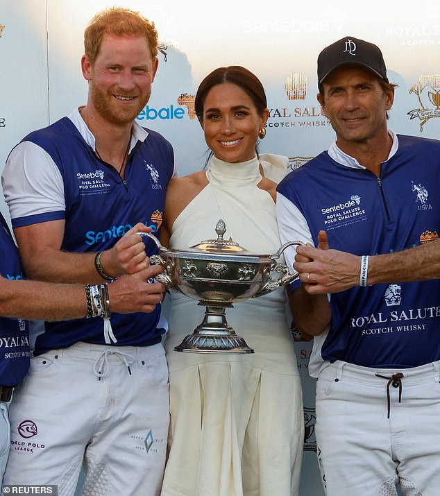 Pictured: The Duke and Duchess of Sussex pose with Adolfo Cambiaso after Royal Salute's victory at the Royal Salute Polo Challenge in April