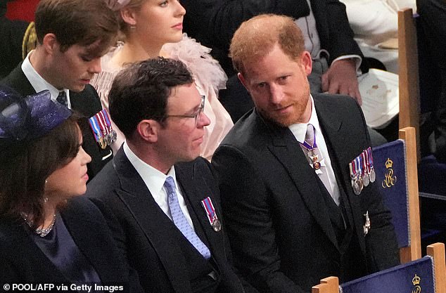 A photo of Jack and Harry in their seats shows them enjoying conversation during the ceremony - demonstrating their 'bromance'