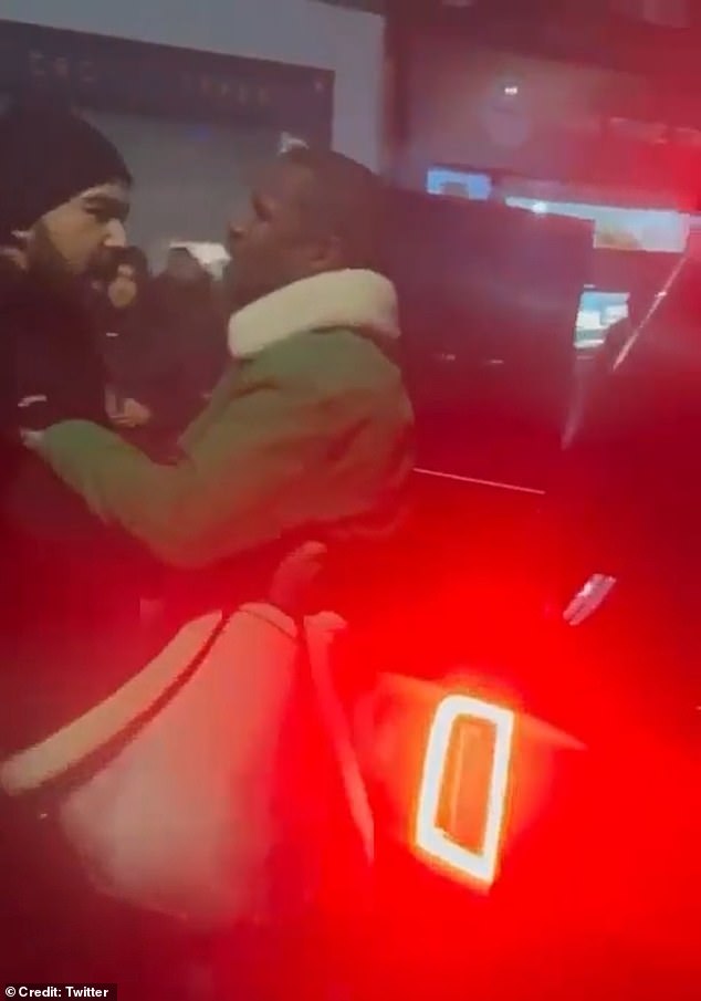 Floyd had to be restrained by his security team as they tried to get him into the car