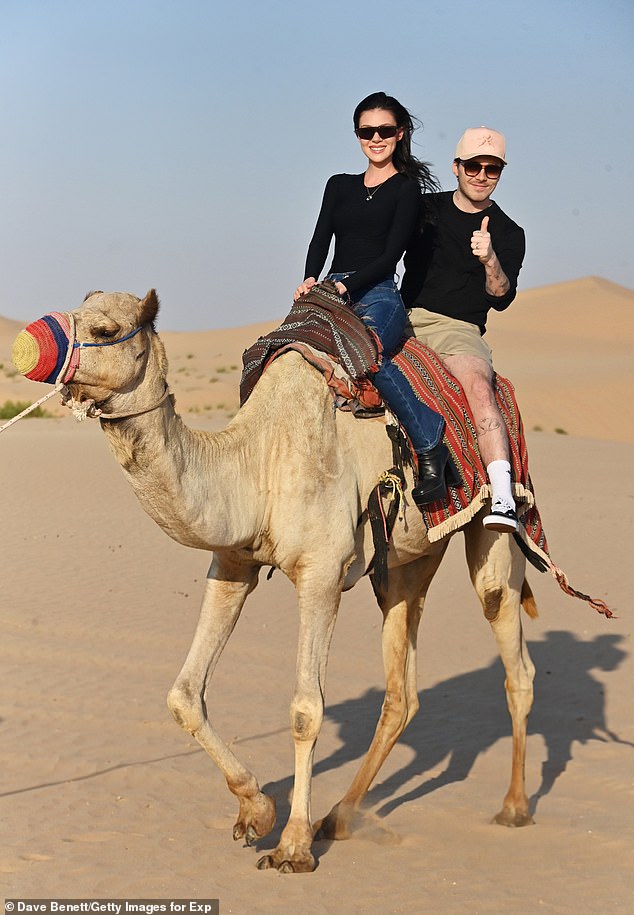 The couple, who married in 2022, made the most of their trip to the capital of the United Arab Emirates as they went on a desert safari