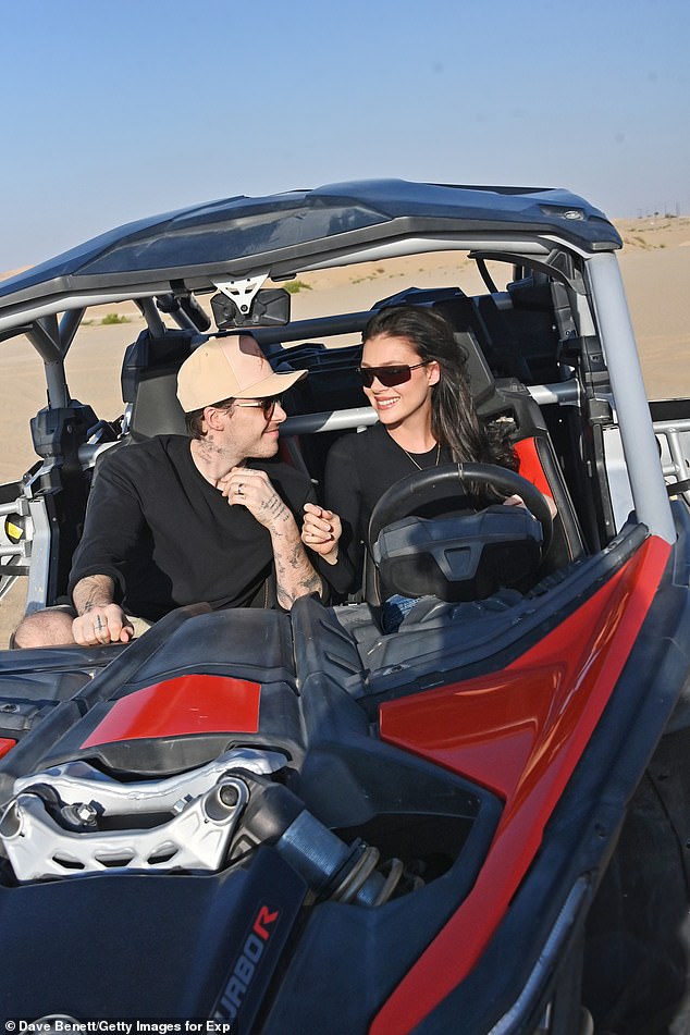 The pair later hopped into a buggy as the actress drove them through the sand dunes during the busy day out