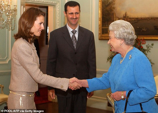 Asma and Bashar al-Assad meet the queen in 2002. Later, when Asma's husband's henchmen skinned their victims alive, she dressed herself in designer labels.