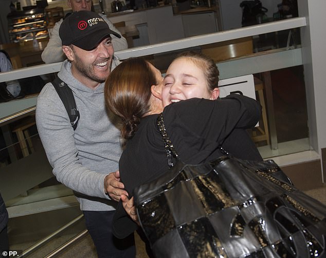 Sweet snaps showed the mum-of-four, 38, beaming at the young girl before wrapping her in a warm hug as Sienna wiped away tears