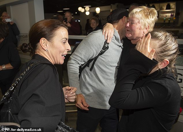 Alan and Coleen's homecoming came just a few hours after GK landed at Heathrow Airport earlier in the day, accompanied by her friend Ella Rutherford.