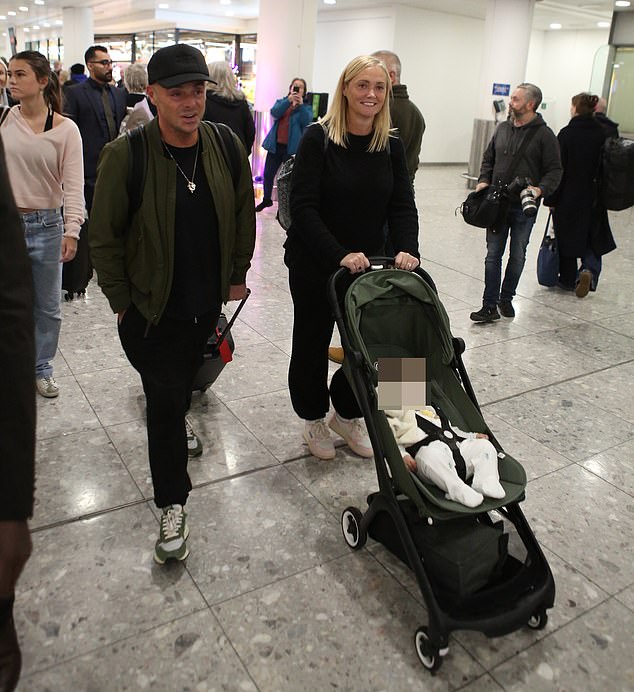 McPartlin, 49, greeted onlookers with a smile as he crossed the room with his wife Anne-Marie and the couple's son