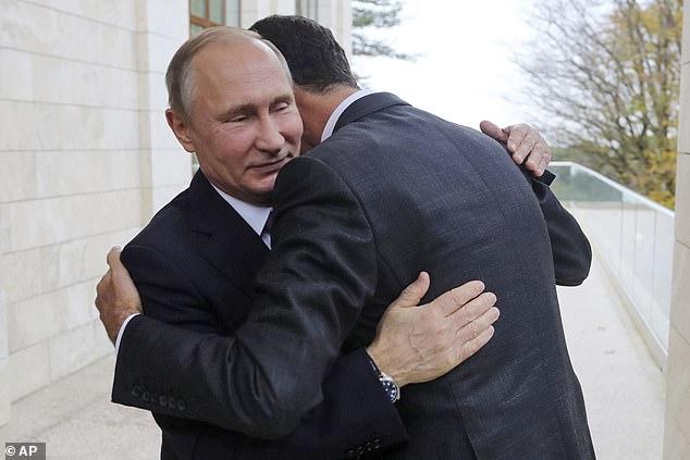 Putin hugs Assad during a meeting in 2017. Russia has built up a huge military presence in Syria with an air base in Latakia and a naval facility in Tartus – the only Russian naval hub in the Mediterranean