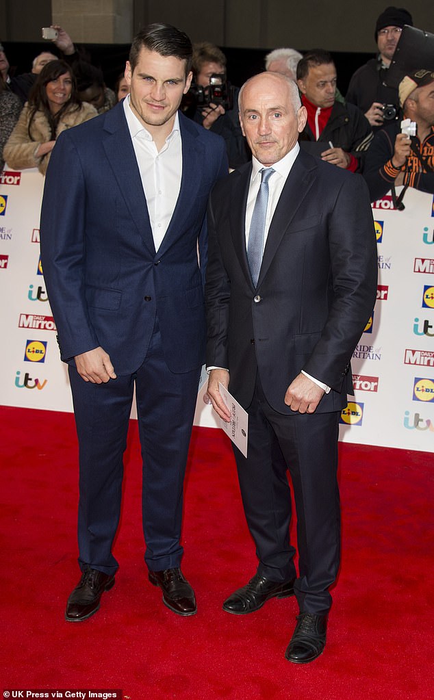 The sports professional works as a boxing trainer and owns a gym in South West London, where he has been in the field since his father introduced him to it as a teenager (pictured with Barry in 2014)