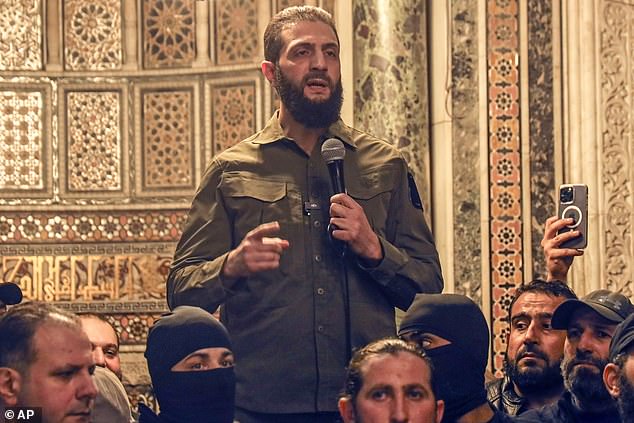 Abu Mohammed al-Golani speaks at the Umayyad Mosque in Damascus on Sunday, December 8