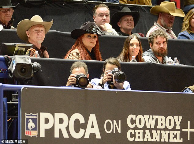 Wynonna and her husband wore cowboy hats for the occasion