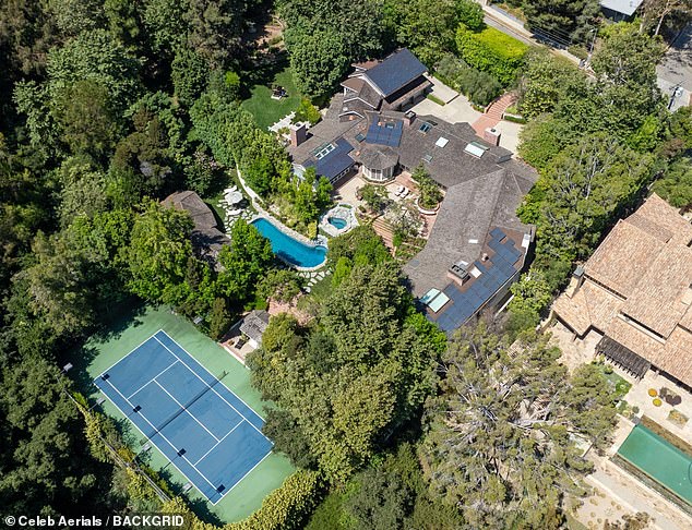 Finances appear to be on Carrey's mind, though, as he's also still eyeing a big payout for his gorgeous Los Angeles mansion, which is still on the market after a series of his price cuts, according to Realtor.com