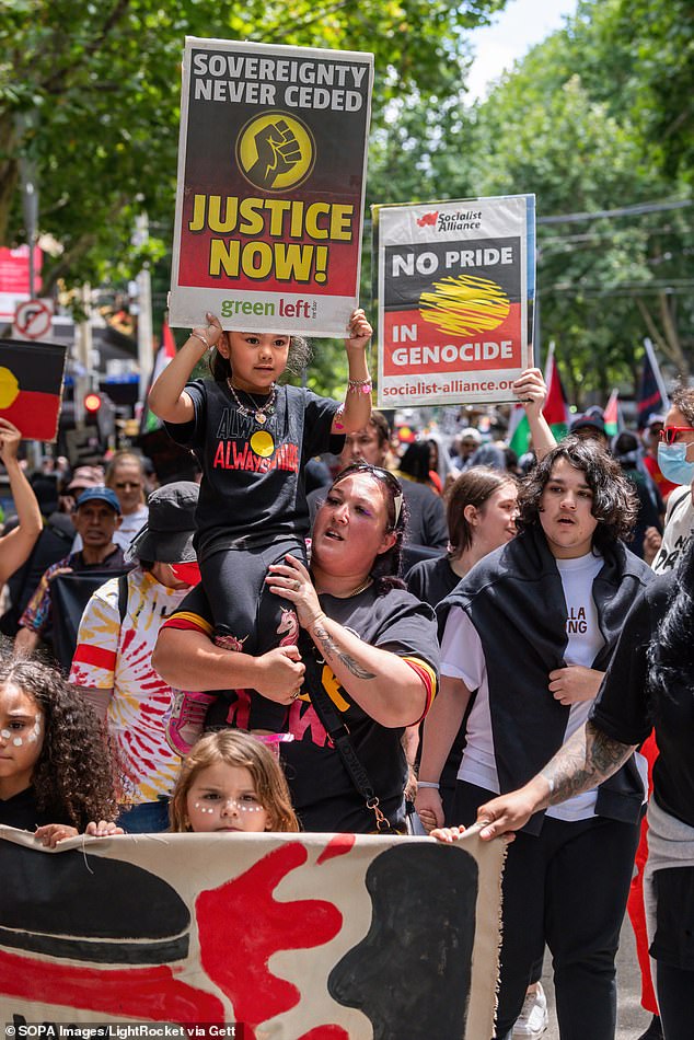 For Indigenous and First Nations people, January 26 is a 'day of mourning' because it marks when Britain colonized their land (photo, demonstrators at the annual Invasion Day rally)