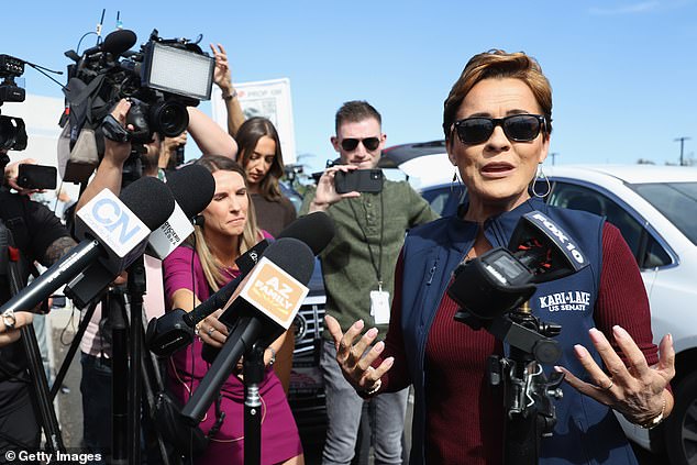 Arizona Republican U.S. Senate candidate Kari Lake speaks to the media outside the Mesa Convention Center polling place on November 5, 2024 in Mesa, Arizona