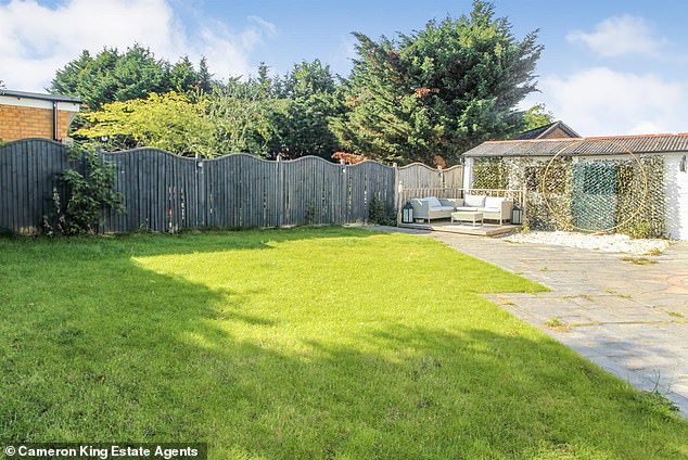 Going green: The St George's Crescent house in Slough features a large lawned rear garden