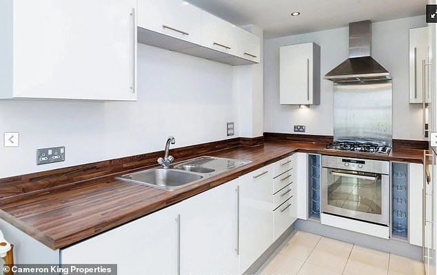 Ready to move in: The property for sale on Langtree Avenue has a modern fitted kitchen