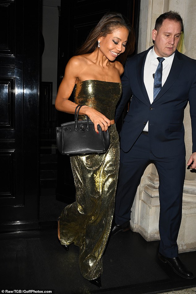 Emma Wymouth looked stunning in a gold, sparkly two-piece suit