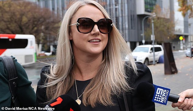 Raina Cruise (pictured) was brazen outside the Adelaide court and instead issued a bizarre warning to her victim, officer Anthea Beck