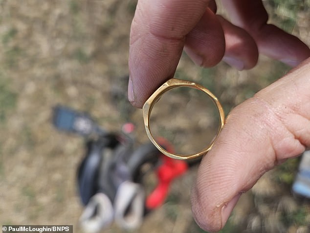 The 32-year-old dug 8 centimeters into the ground and discovered the beautiful gold ring with an intricate carving of Catholic martyr Saint Christopher on it.