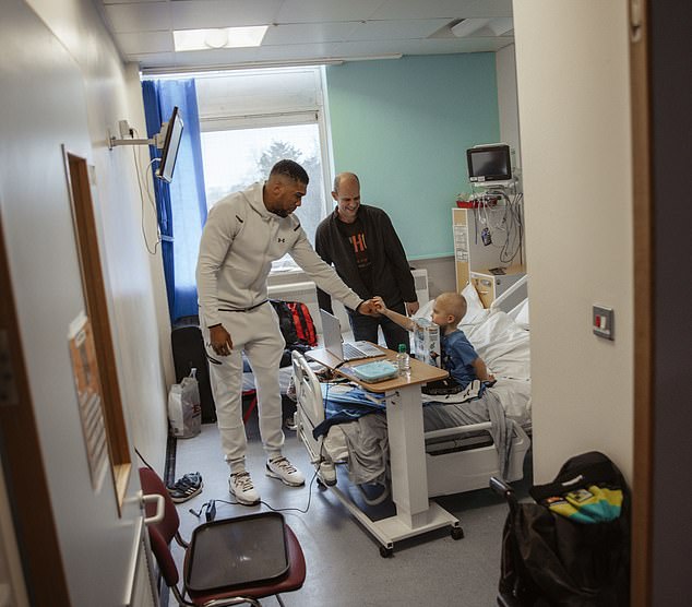 The two-time world heavyweight champion took time out of his busy schedule to visit the department as part of his ongoing work with Clean Hearts Community, the local initiative he founded.