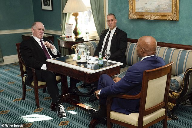 New York Mayor Eric Adams, right, meets the arrival of newly elected President Donald Trump "border czar" Tom Homan