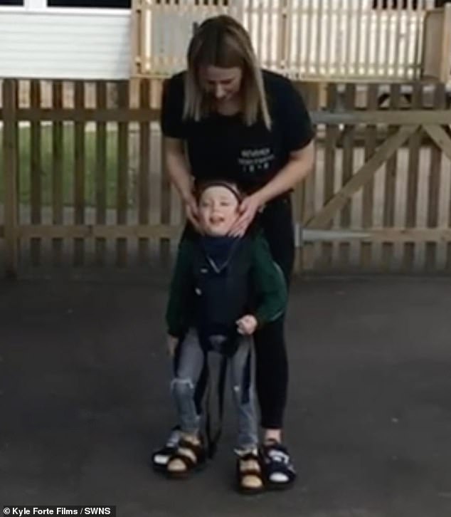 Frankie's favorite machine was the Upsy, which helps him stand up, hold his head up and walk, assisted by an adult